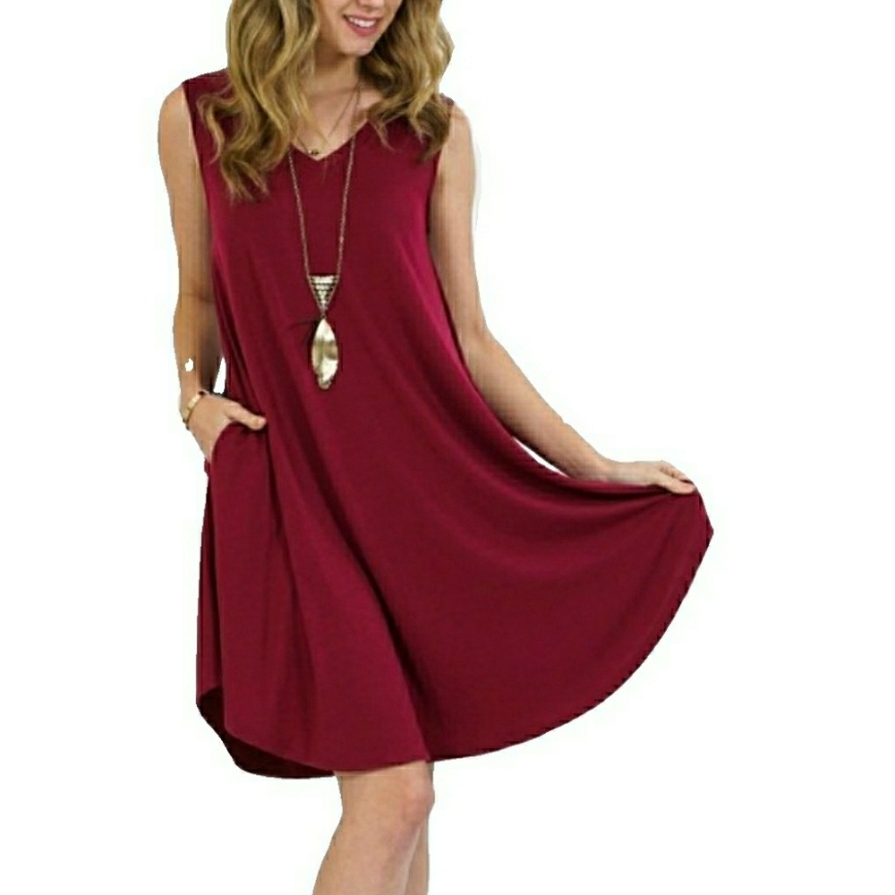 **SOLD OUTNEW V NECK SLVLSS ROUND HEM POCKET DRESS - Picture 1 of 6